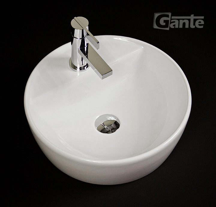 white countertop basin