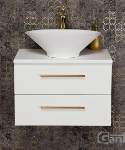 White vanity unit with gold tap
