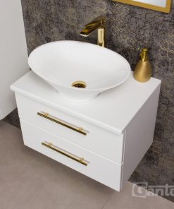 White vanity unit with gold tap
